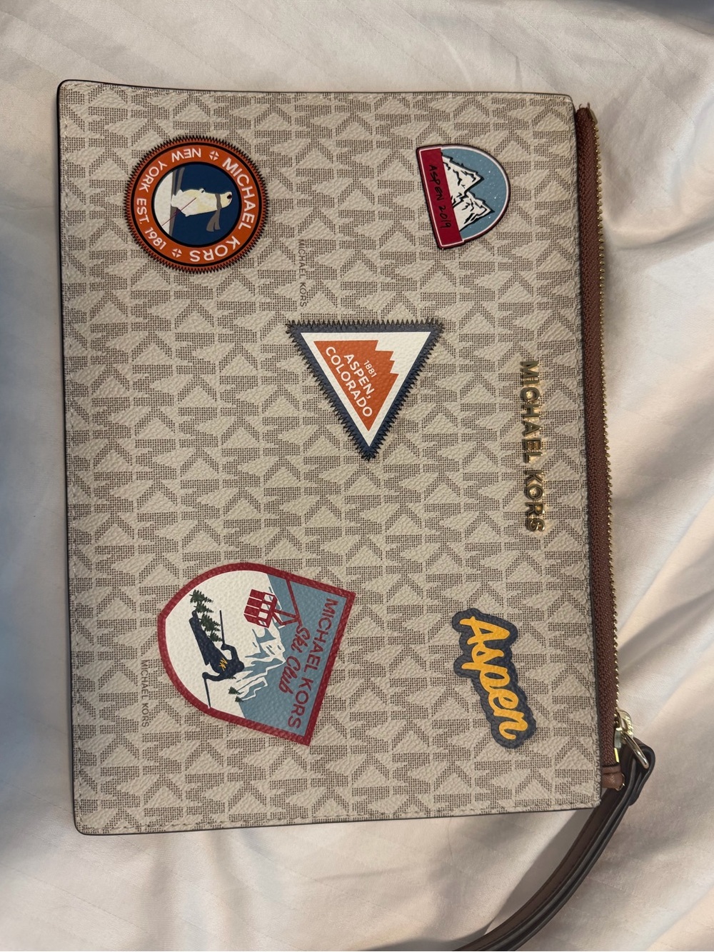 Michael Kors Beige Logo Wristlet Pouch with Multicolor Patch Accents